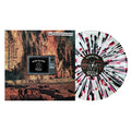 A presale vinyl LP with a black and red splatter design by The Bar Stool Preachers sits beside its album cover, featuring a TV displaying “Below the Static” in a forest of burnt trees, with the band name at the top.