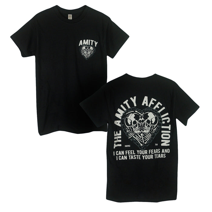 Black t-shirt by The Amity Affliction featuring an AMITY skull heart graphic on the front, and on the back, band text with a large skull heart and the phrase I CAN FEEL YOUR FEARS AND I CAN TASTE YOUR TEARS.