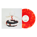 A cloudy blood red and white marbled vinyl from Counterparts’ 2nd press sits beside an album cover featuring a white cherub statue, a black pool with red liquid spilling over, and a small lamb resting in the center.