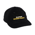 This black cotton corduroy cap by Super Sometimes features bold yellow and white SUPER SOMETIMES text embroidered on the front.