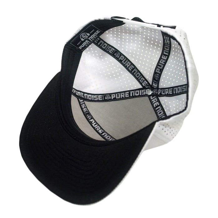 A Pure Noise Records Merch black and white mesh trucker hat is shown inside out, displaying its black interior lining and cross straps printed with PURE NOISE in white.