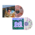 Shoreline offers two vibrant vinyl records: an Amber Deluxe Marble Vinyl featuring a blurred figure in the artwork, and a presale album with an illustrated lilac trio on grass, each housed in matching sleeves.