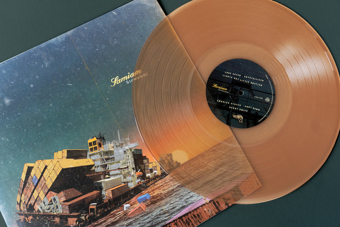 A tan-colored vinyl record by Samiam, partially pulled from its cover featuring a sunset cargo ship with stacked containers on water, marks the album’s 3rd pressing.