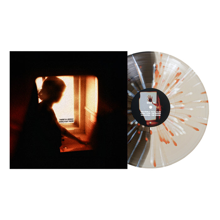 Arm's Length limited edition 2nd Press vinyl with black and orange splatter sits next to an album cover showing a silhouette by a warmly lit window—only 1500 units produced.