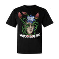 The Story So Far black T-shirt in midweight fabric features a face graphic wrapped in green vines and red flowers. “THE STORY SO FAR” is printed above, with “WHAT YOU DON’T SEE” below in distressed white and red text.