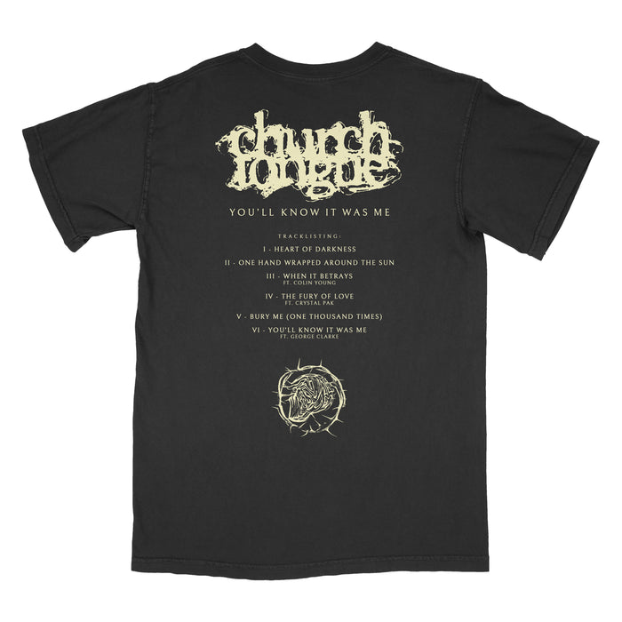 Church Tongue’s black Comfort Colors tee features the band name in distressed text, “YOULL KNOW IT WAS ME” below, song titles with Roman numerals, and an abstract spiky white graphic near the bottom.